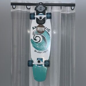 Kryptonics White & Teal Wave Skateboard
28” Cruiser, slight nick (small circle)